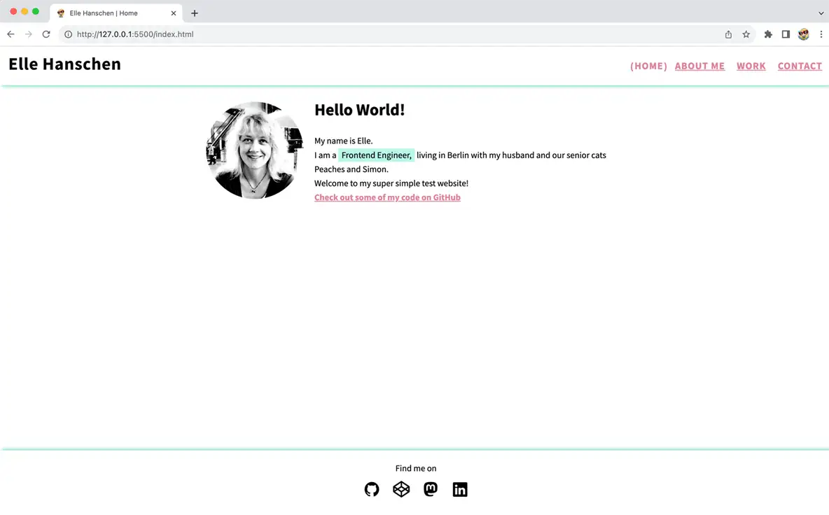 browser screenshot of the index.html with old, simple styling, showing a 'Hello World!' greeting plus an intro text, a picture of Elle and a link to Elle GitHub account